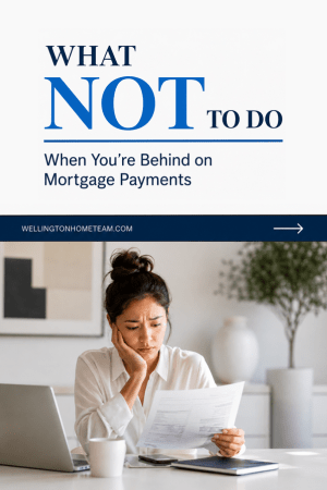 Woman behind on mortgage payments reviewing bills at a desk