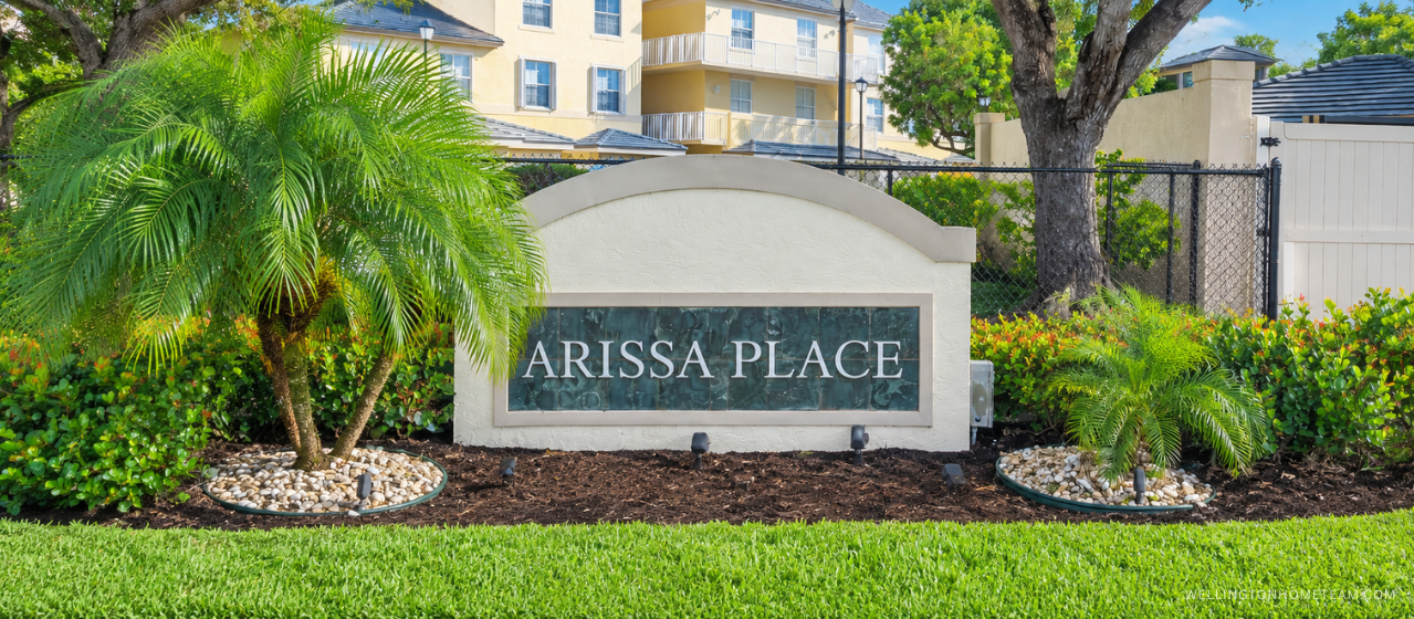 Arissa Place community entrance sign surrounded by palm trees in Wellington, FL