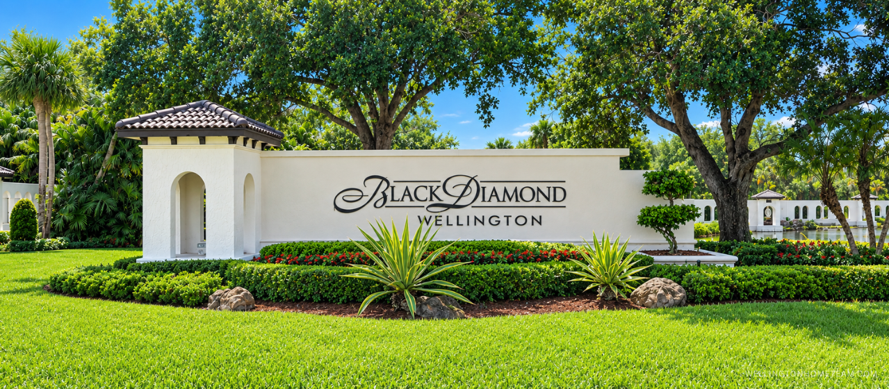 Black Diamond community entrance sign surrounded by palm trees in Wellington, FL
