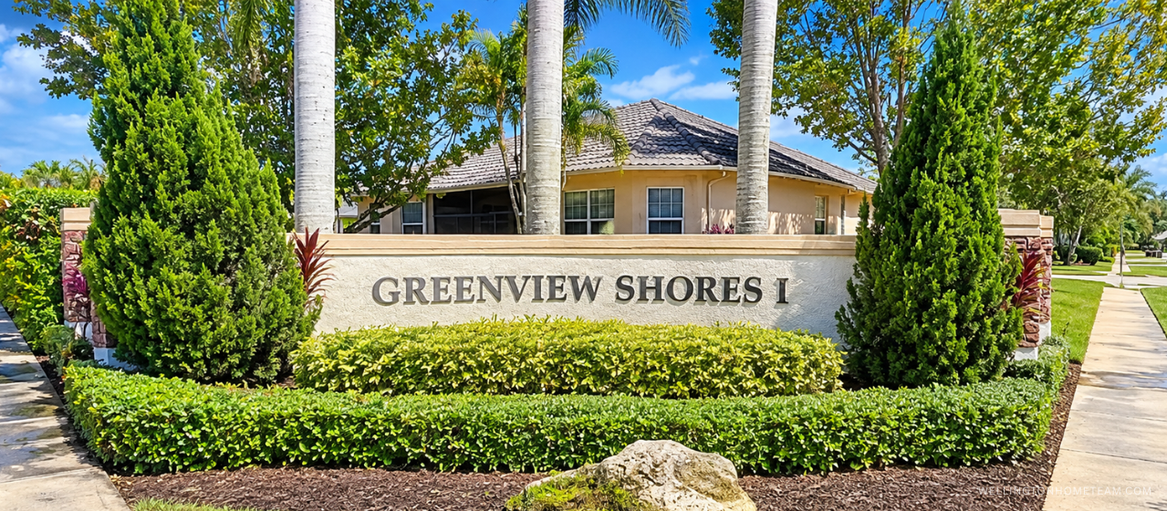 Greenview Shores community entrance sign surrounded by palm trees in Wellington, FL