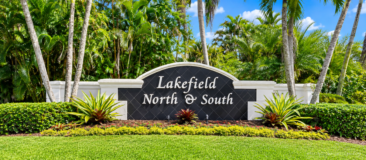 Lakefield South community entrance sign surrounded by palm trees in Wellington, FL