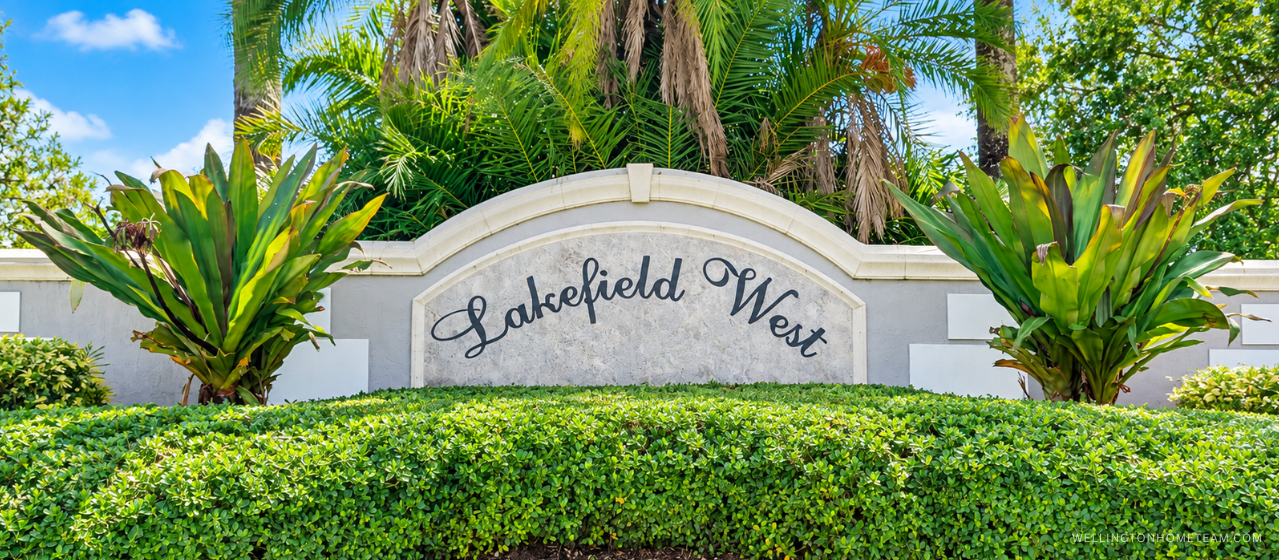 Lakefield West community entrance sign surrounded by palm trees in Wellington, FL