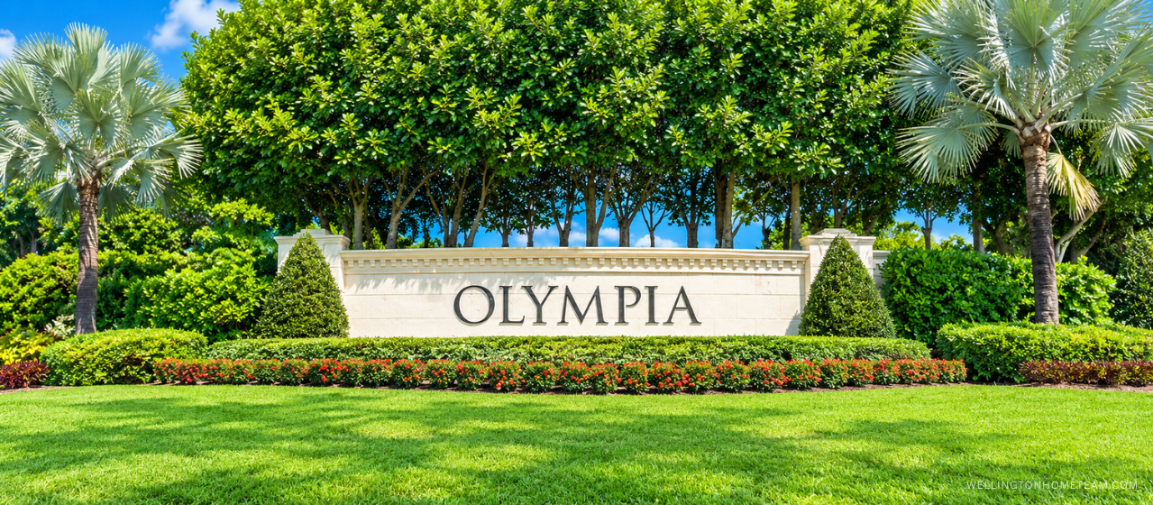 Olympia community entrance sign surrounded by palm trees in Wellington, FL