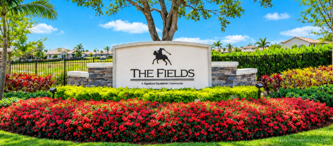 The Fields community entrance sign surrounded by palm trees in Lake Worth FL