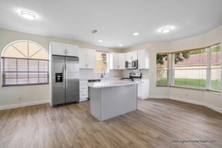 Grand Isles Wellington FL Real Estate and Community Guide Grand Isles Renovated Kitchen with Breakfast Area
